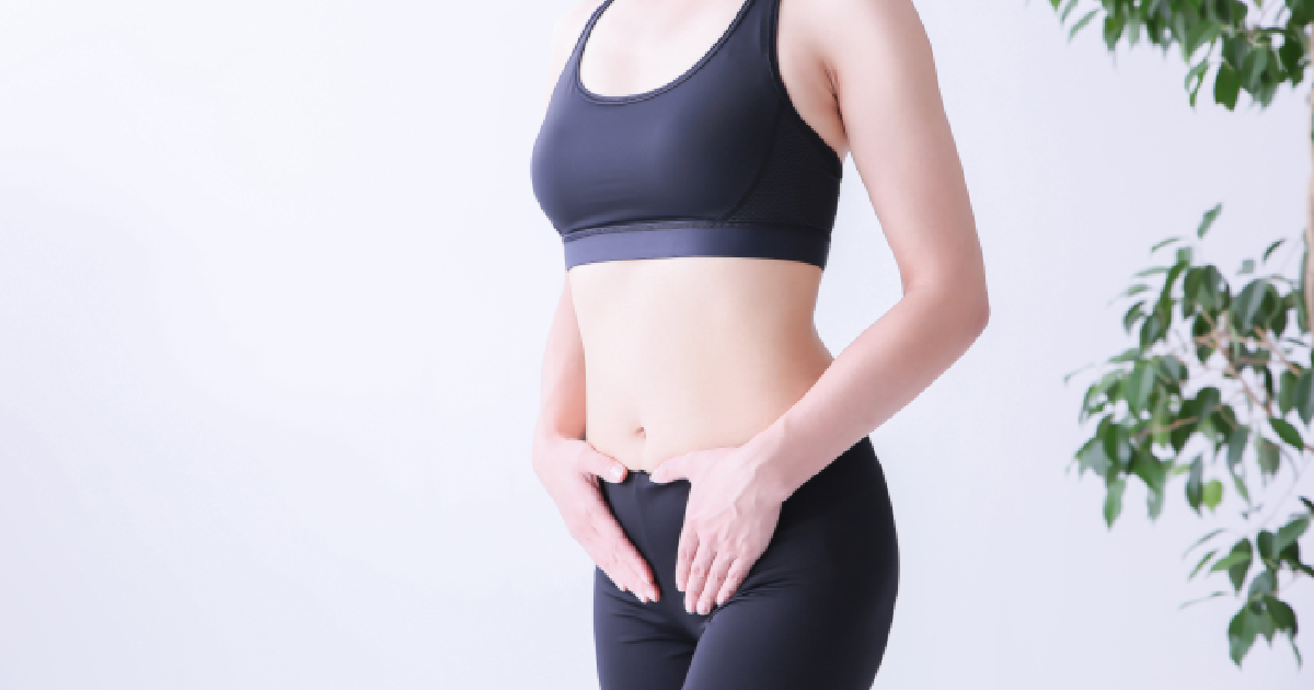 Woman showing a toned midsection, representing results from Fat Dissolving Injections in Coral Springs, FL.